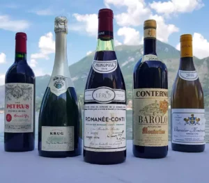 photo de 5 bouteilles de vin et champagne : romnée-conti, barolo, krug, petrus pomerol, chevalier montrachet Villa Serafina Restorante